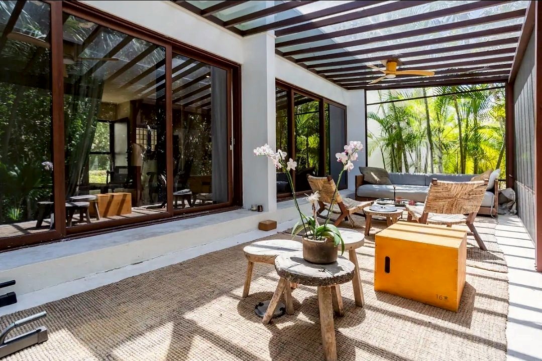 Private garden terrace at a luxury wellness retreat in Akumal, twenty minutes from Tulum, Mexico